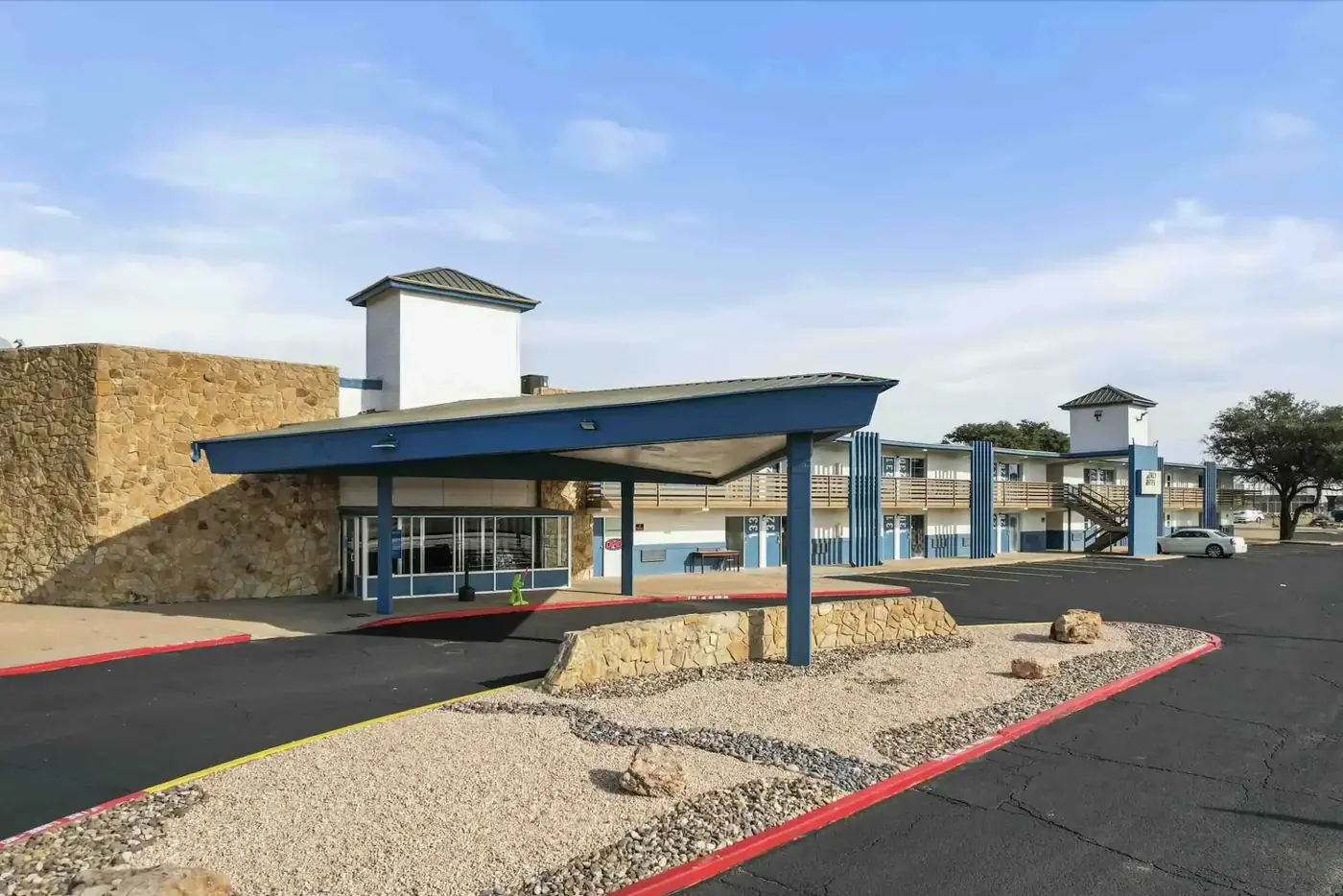 Southern Springs entrance and covered drive-up on Avenue Q